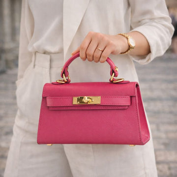 Bolso en Piel Pregato mini Latenza Fucsia